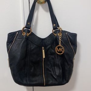 Michael Kors black and gold purse